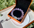 Chunky amethyst round beads bracelet (13.5mm+), featuring a clear Quartz Carved Dzi Bead. Fits wrists up to 17 cm. (26-134)