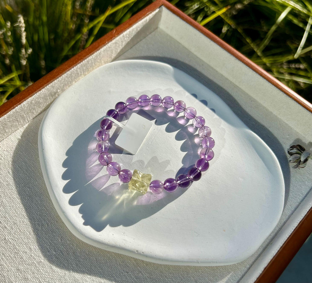 Super clean Amethyst beads bracelet featuring a high quality Libyan bead, fits up to 16.7cm wrist (26-140)