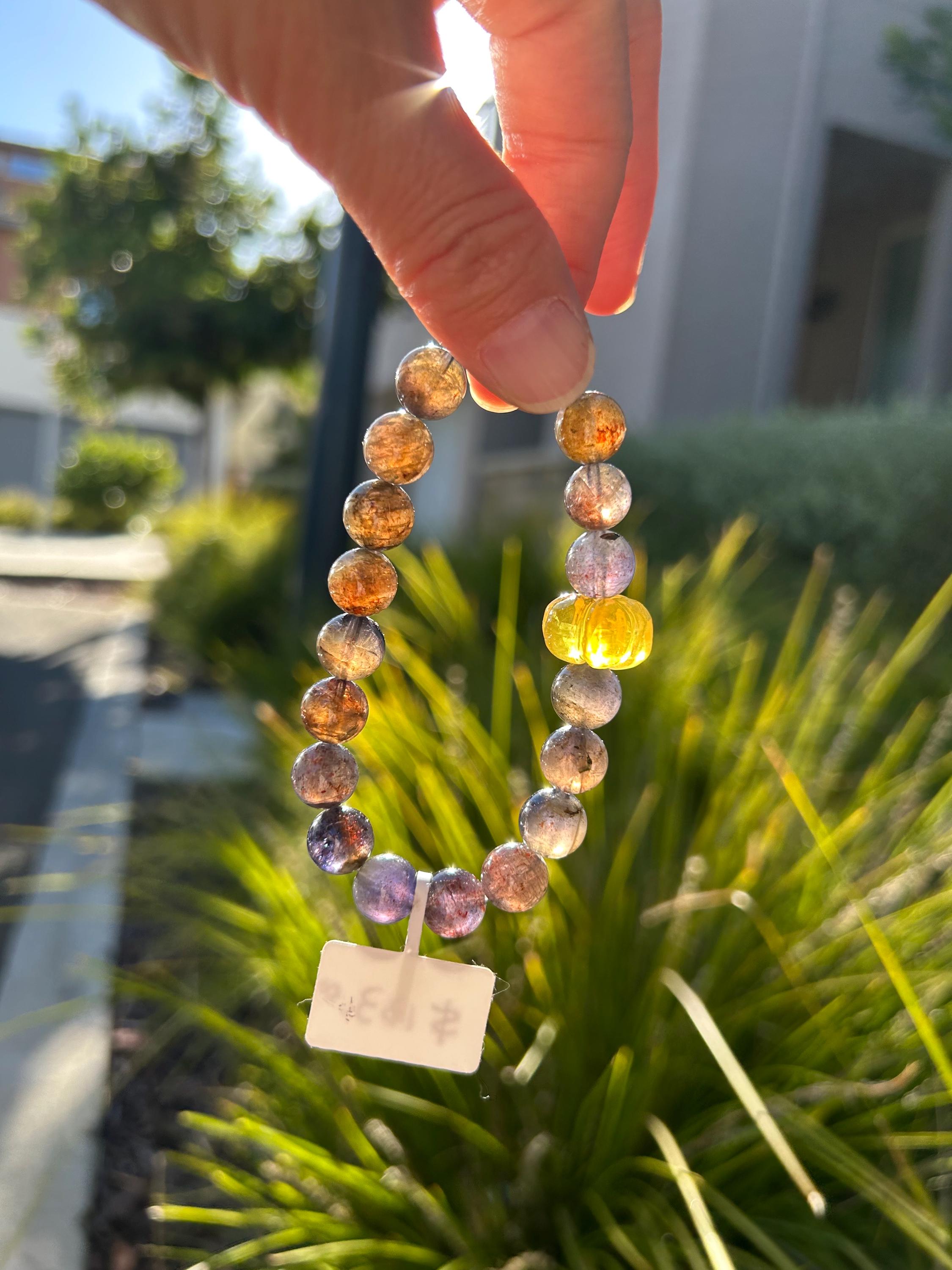Sunstone iolite with Blood-Like Inclusions 10mm beads bracelet, featuring a tree wax carved squash, Fits up to 16.2cm wrist (26-149)
