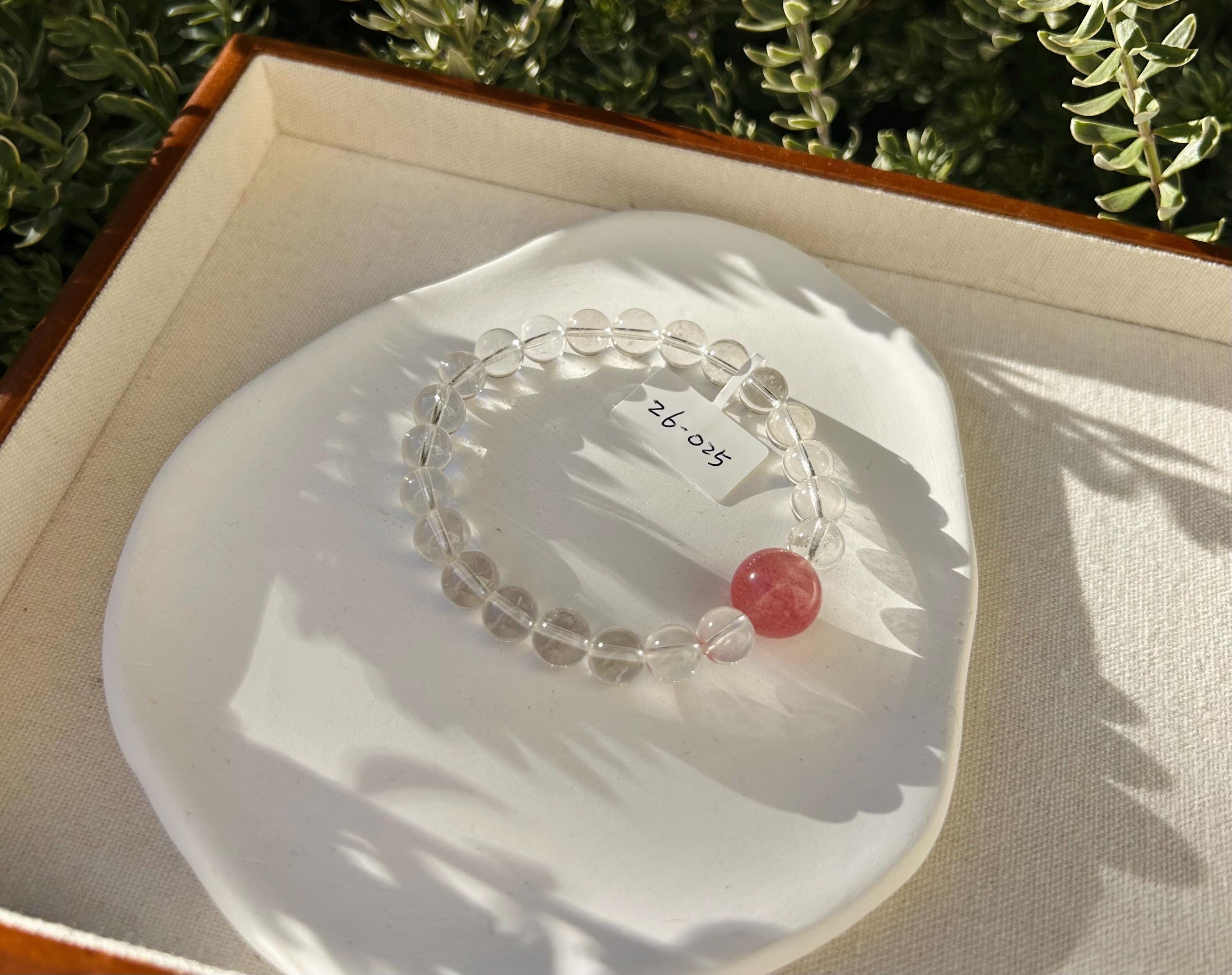 High Quality Clear quartz beads with 1 big strawberry quartz bead crystal bracelet, 8mm+ beads, fits up to 17cm wrist (26-025)