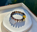 Sunstone iolite with Blood-Like Inclusions 10mm beads bracelet, featuring a tree wax carved squash, Fits up to 16.2cm wrist (26-149)